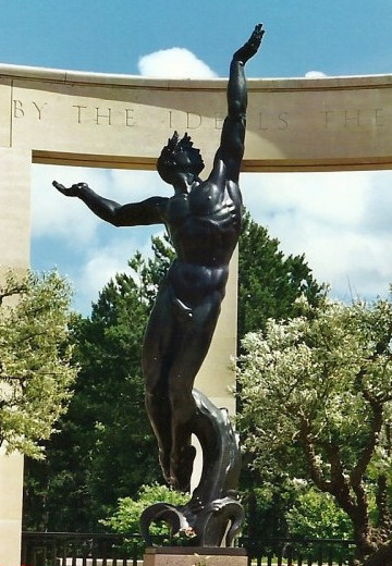 Statue of youth rising from the waves